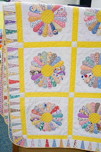 Dresden plate quilt made by members